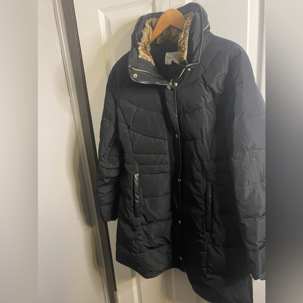 Cole Haan women’s large black coat with zipper stored hood. SEE NOTES.